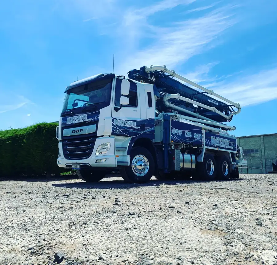 Natcrete 36m concrete boom pump truck parked with the boom folded